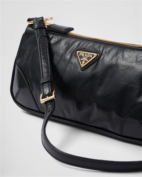 prada re-edition 2002 small leather shoulder bag